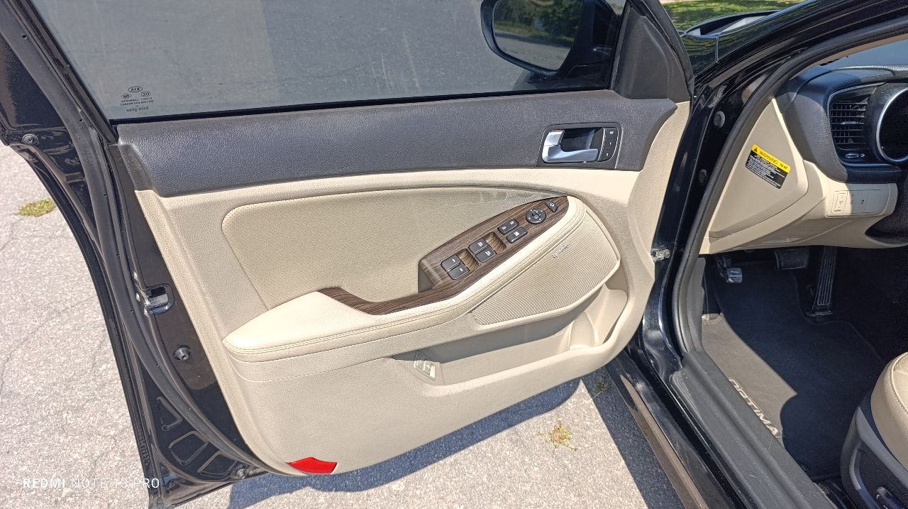 Kia Optima - фото 28