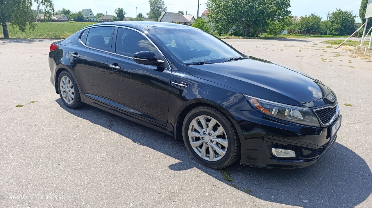 Kia Optima - фото 21