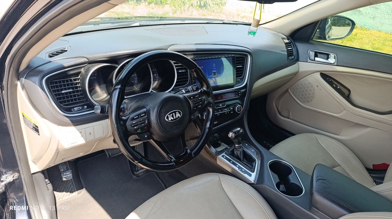 Kia Optima - фото 24