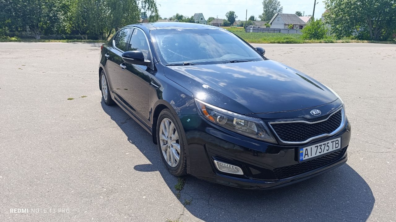 Kia Optima - фото 11