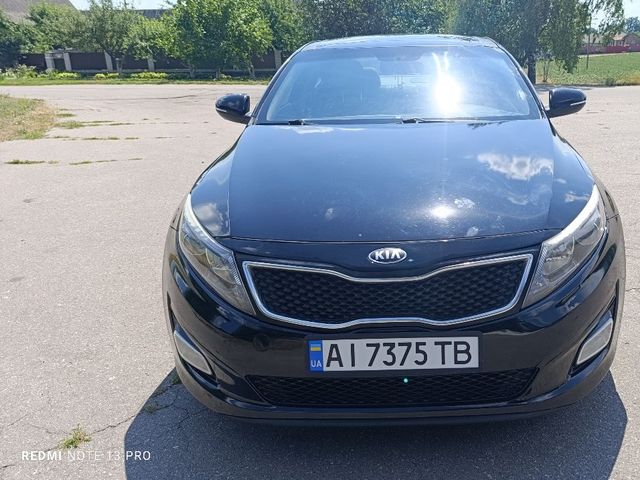 Kia Optima - фото 1