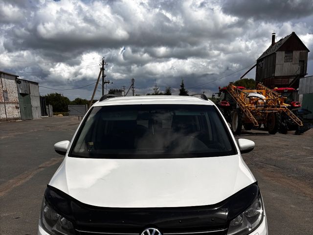 Volkswagen Touran - фото 1