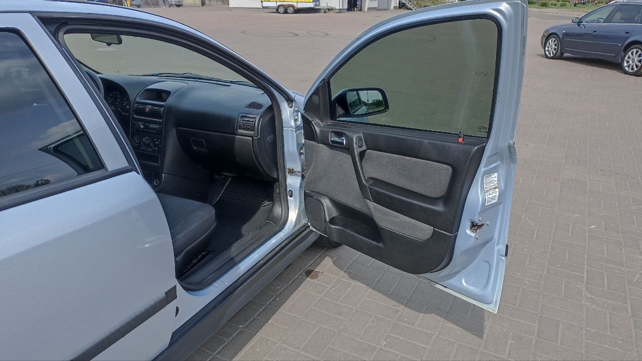 Opel Astra - фото 24