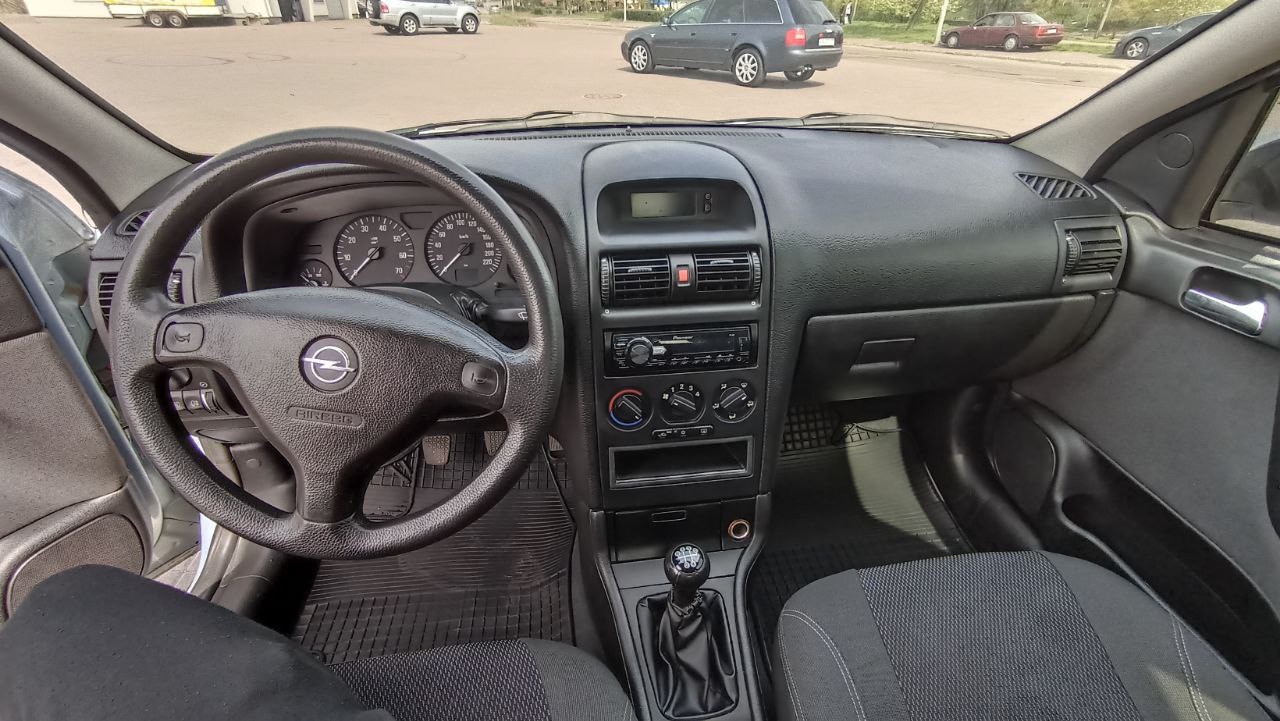 Opel Astra - фото 8