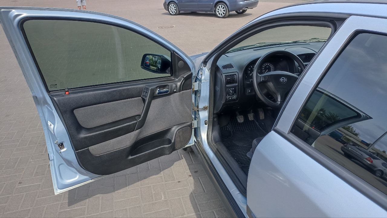 Opel Astra - фото 1