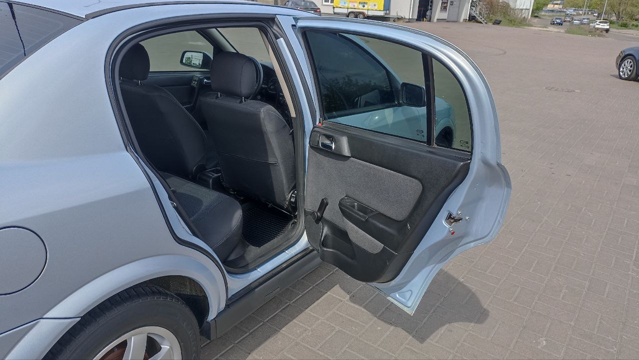 Opel Astra - фото 13
