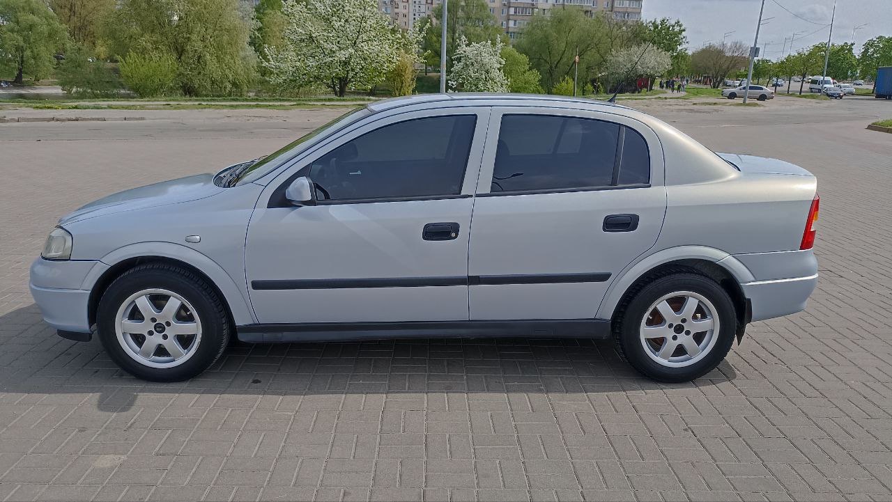 Opel Astra - фото 27