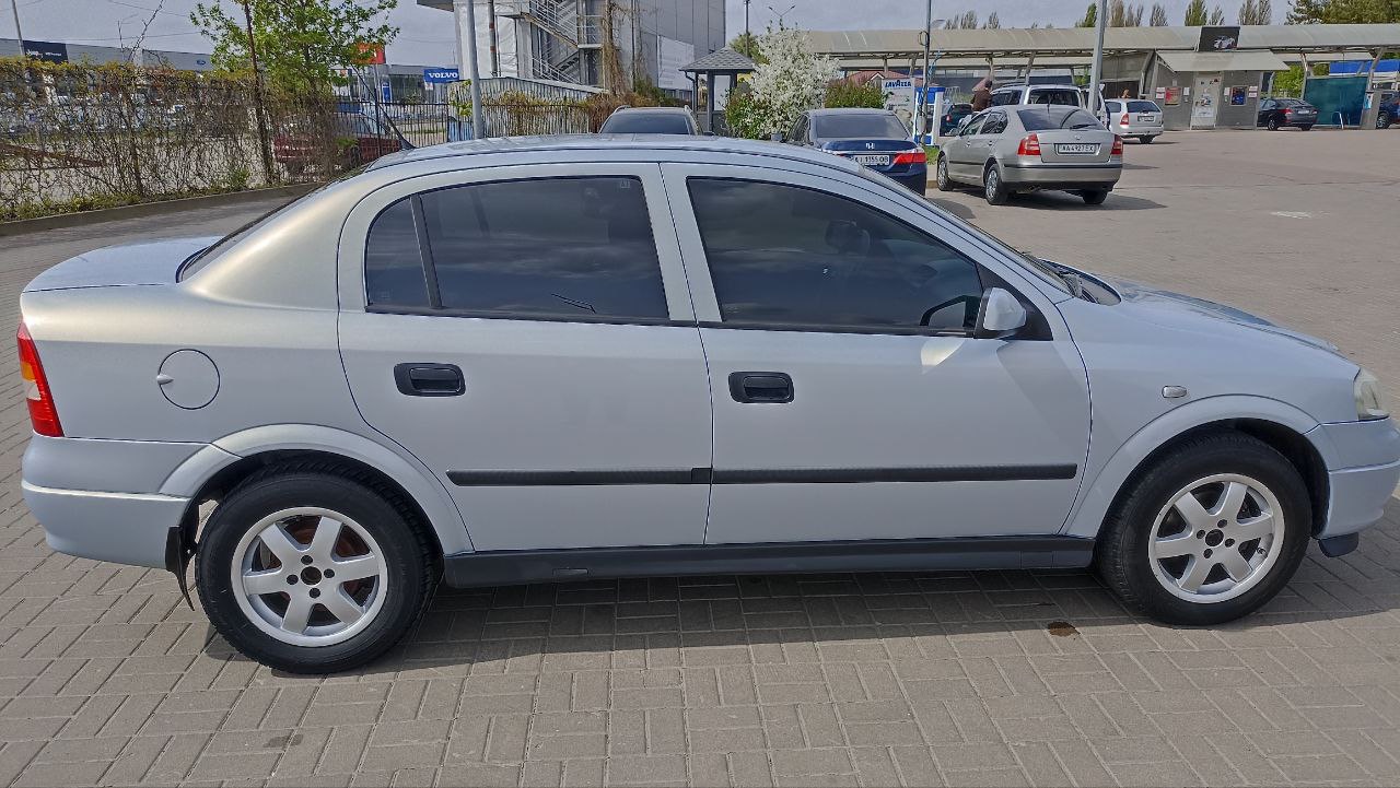 Opel Astra - фото 18