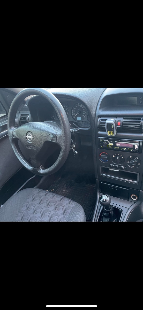 Opel Astra - фото 15