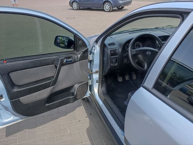 Opel Astra - фото 1