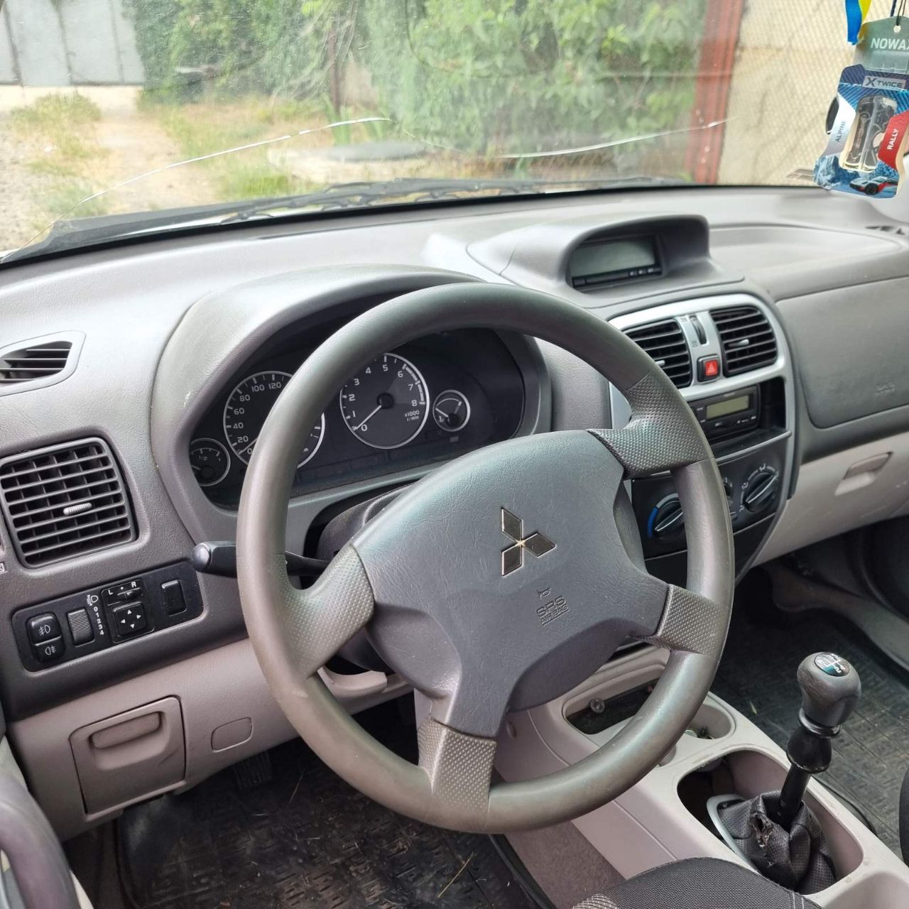 Mitsubishi Space Star - фото 10