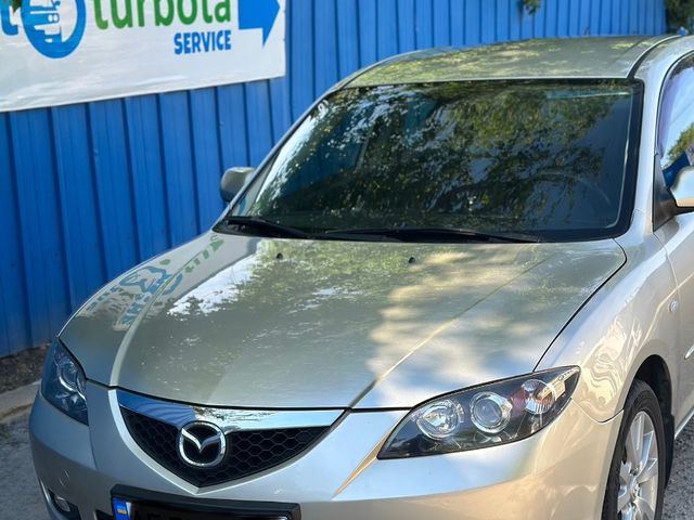 Mazda 3 - фото 1