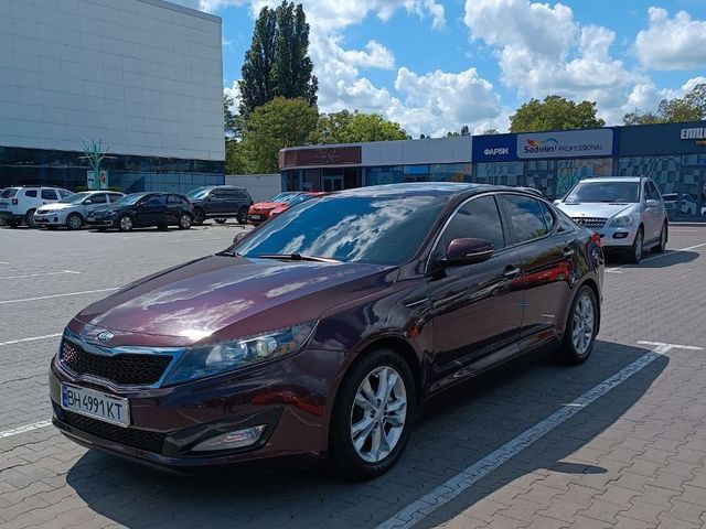 Kia Optima - фото 1