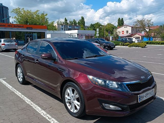 Kia Optima - фото 3