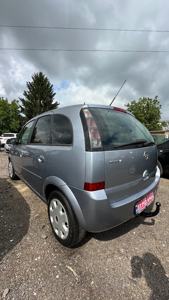 Opel Meriva - фото 16