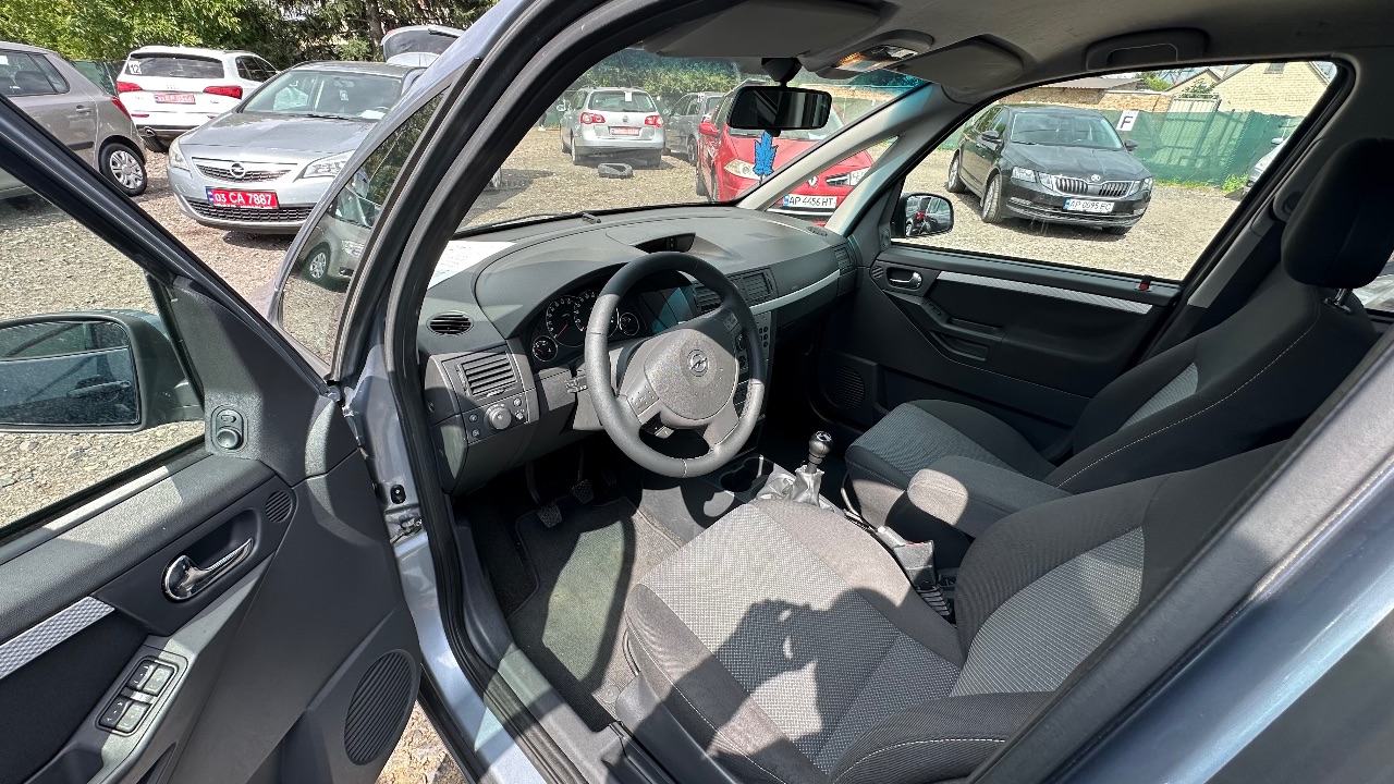 Opel Meriva - фото 8
