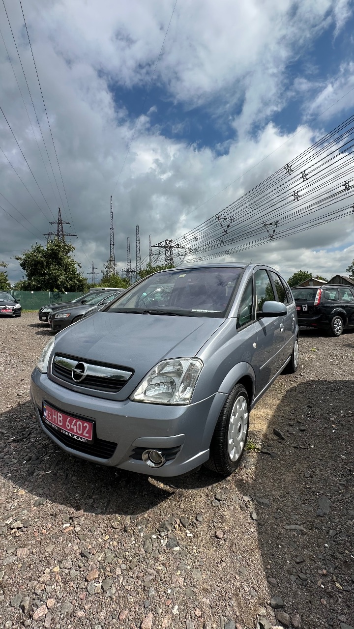 Opel Meriva - фото 17