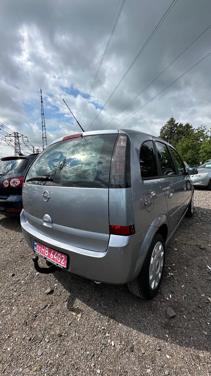 Opel Meriva - фото 20