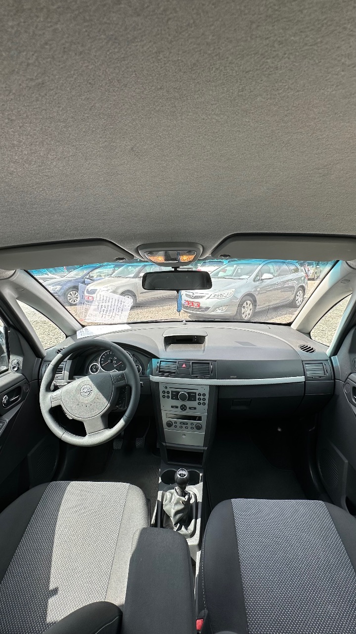 Opel Meriva - фото 26