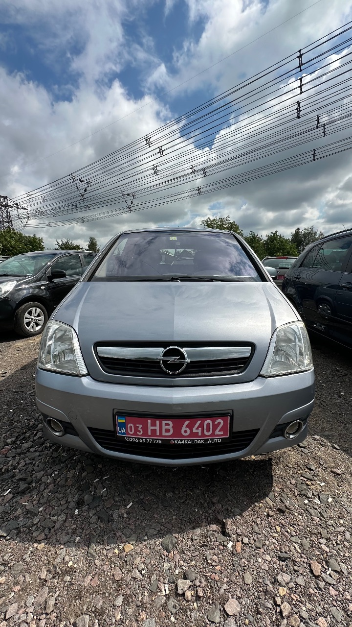 Opel Meriva - фото 18
