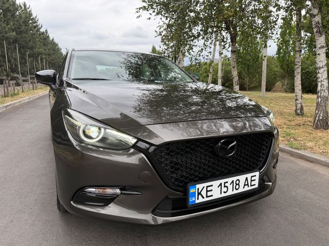 Mazda 3 - фото 4