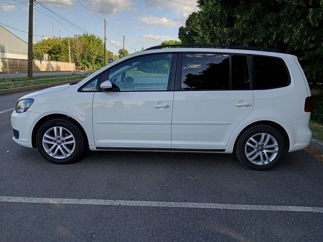 Volkswagen Touran - фото 4