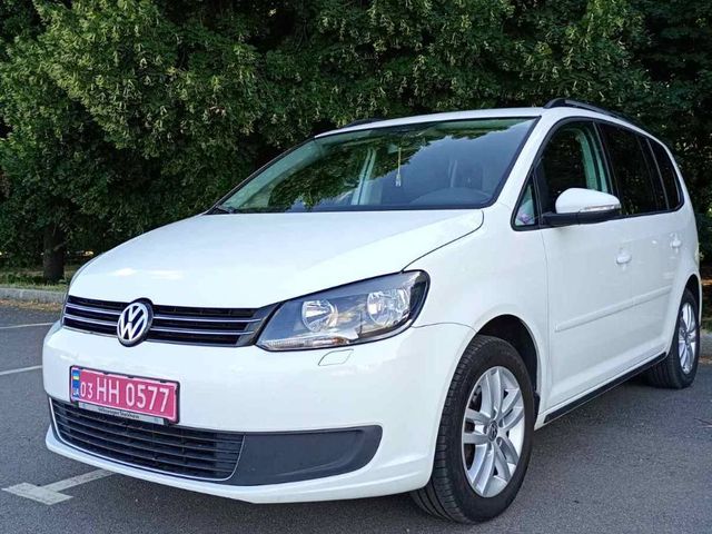 Volkswagen Touran - фото 1