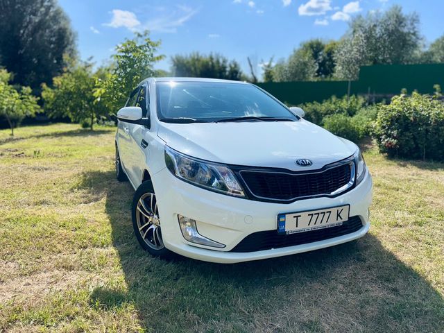 Kia Rio - фото 1