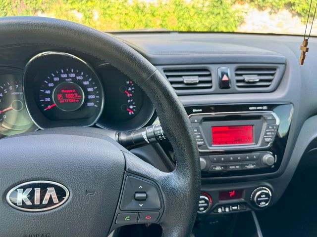 Kia Rio - фото 4