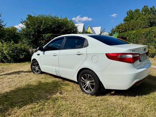 Kia Rio - фото 3