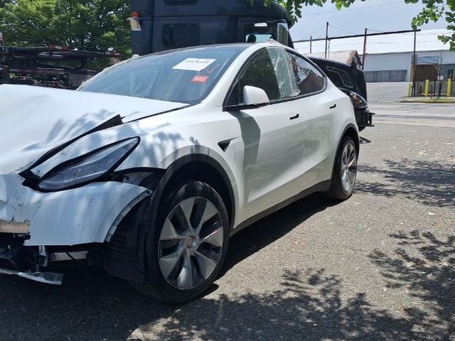Tesla Model Y - фото 2