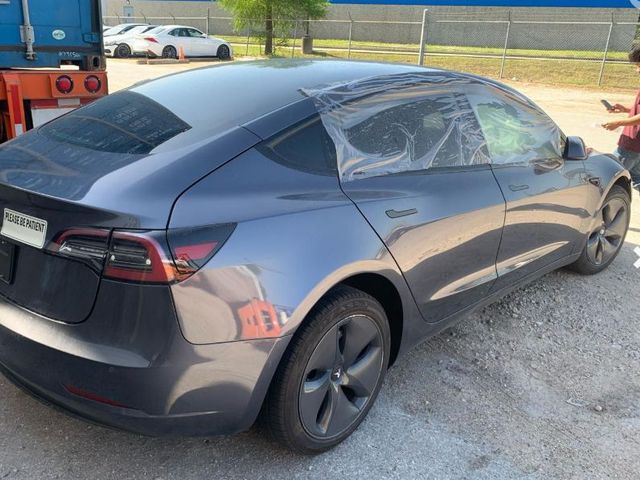 Tesla Model 3 - фото 2