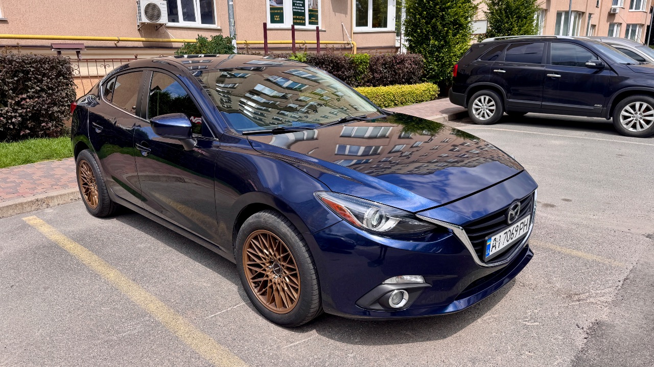 Mazda 3 - фото 2