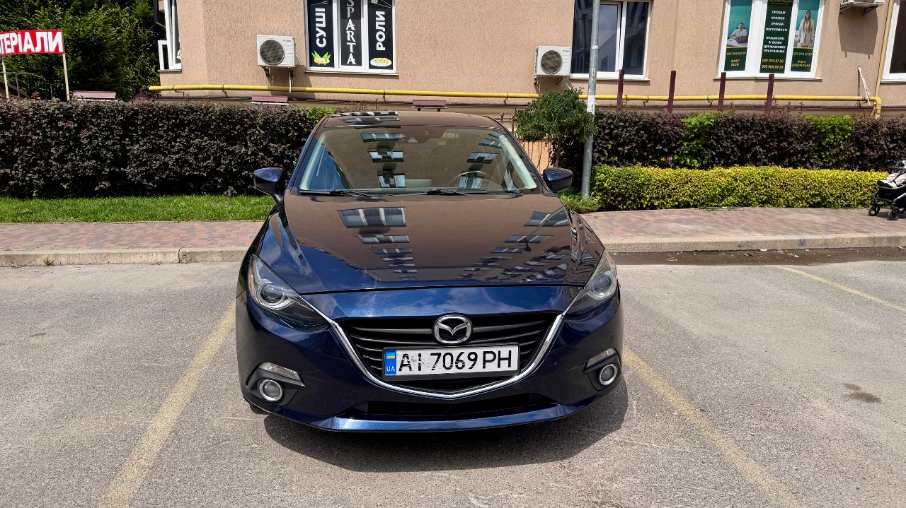 Mazda 3 - фото 1