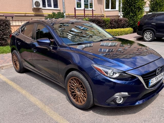 Mazda 3 - фото 2