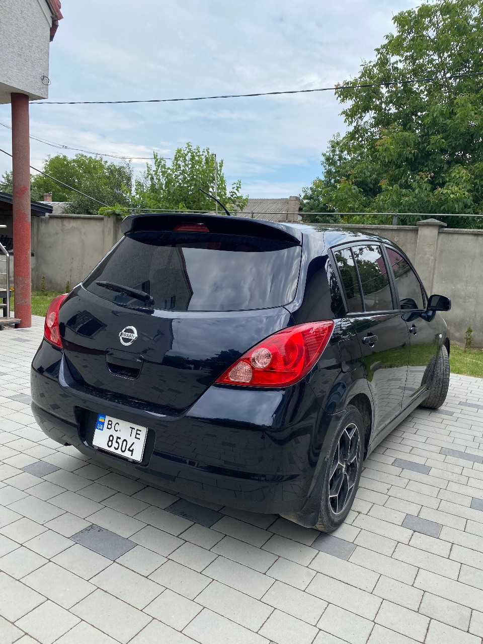 Nissan Tiida - фото 1