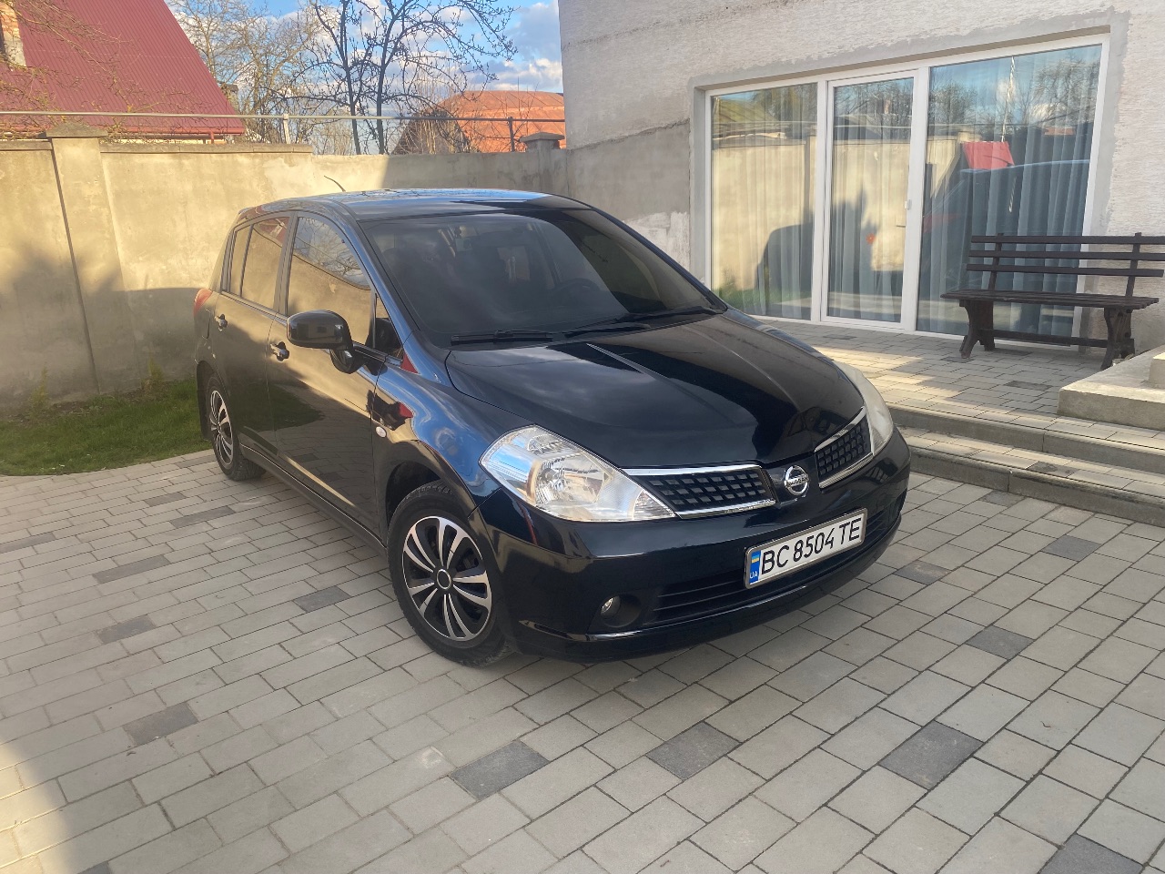 Nissan Tiida - фото 7