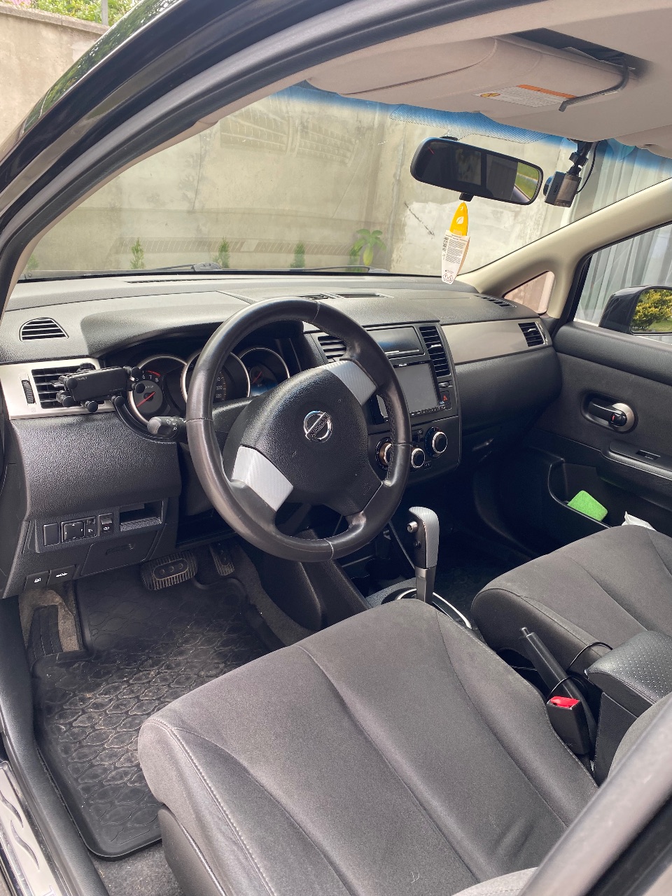 Nissan Tiida - фото 5