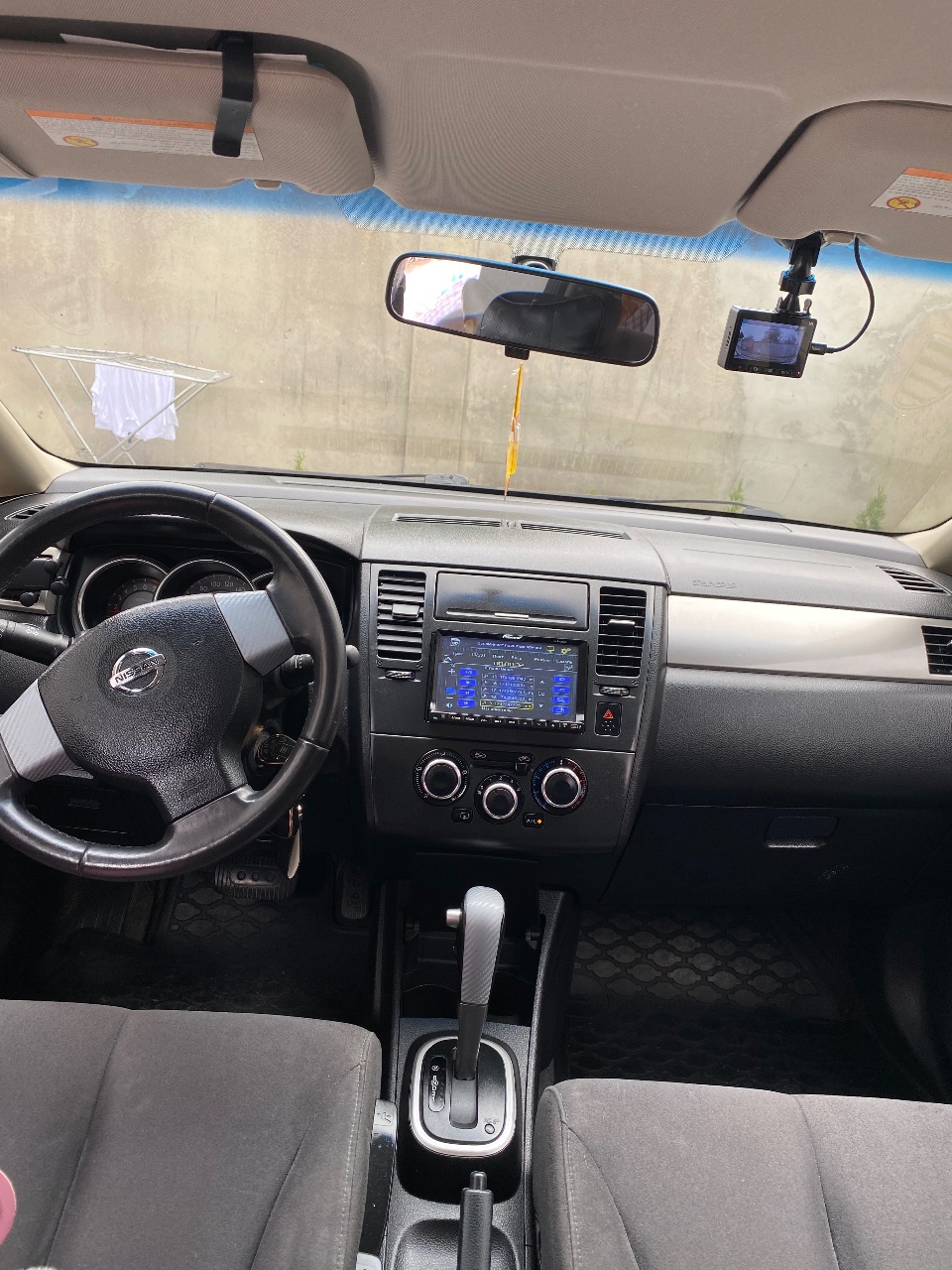 Nissan Tiida - фото 6