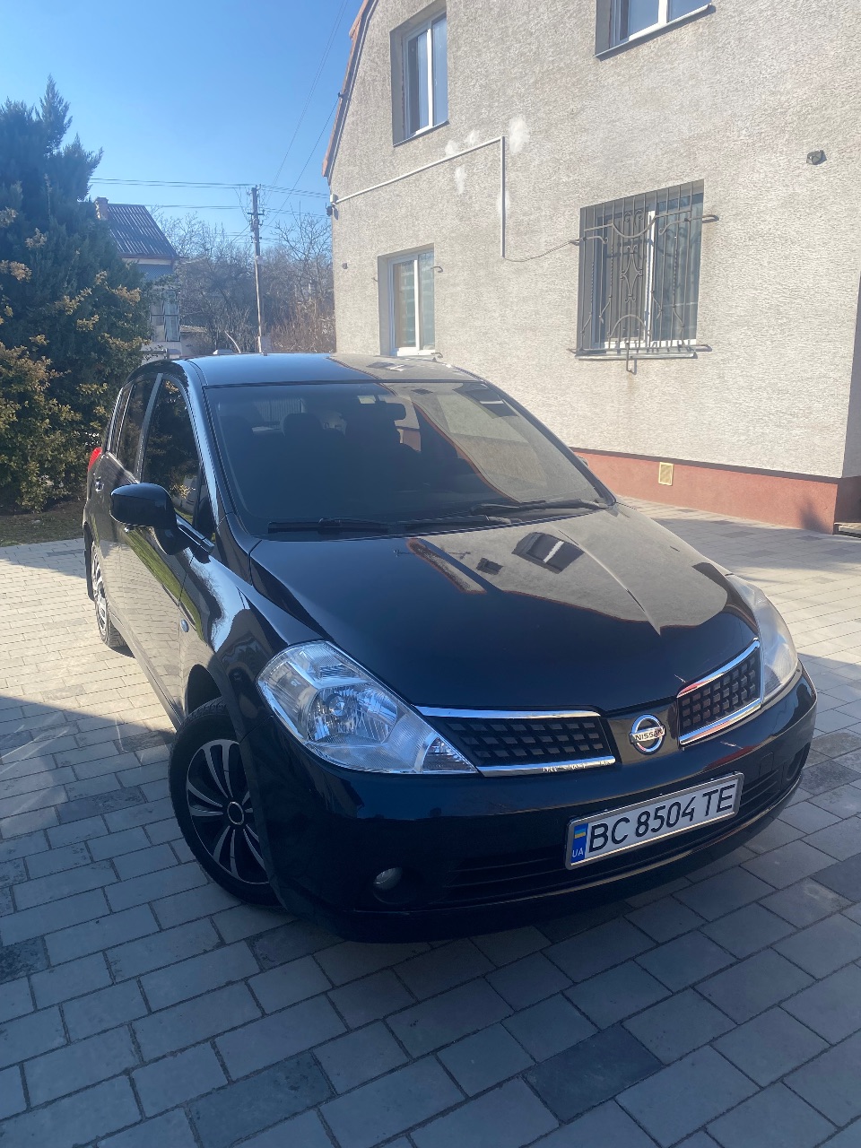 Nissan Tiida - фото 9