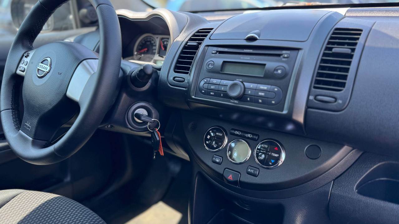 Nissan Note - фото 4