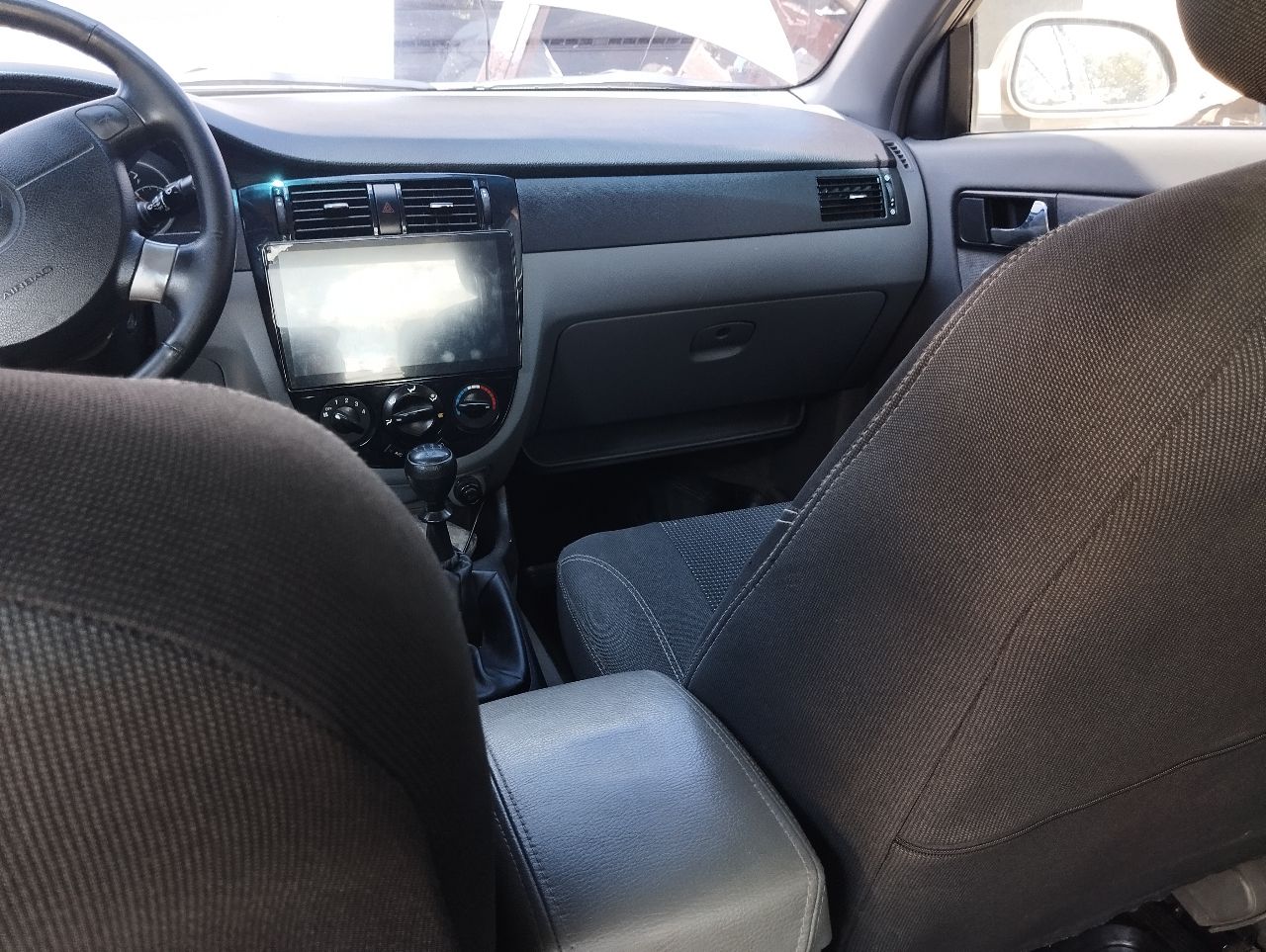 Chevrolet Lacetti - фото 17