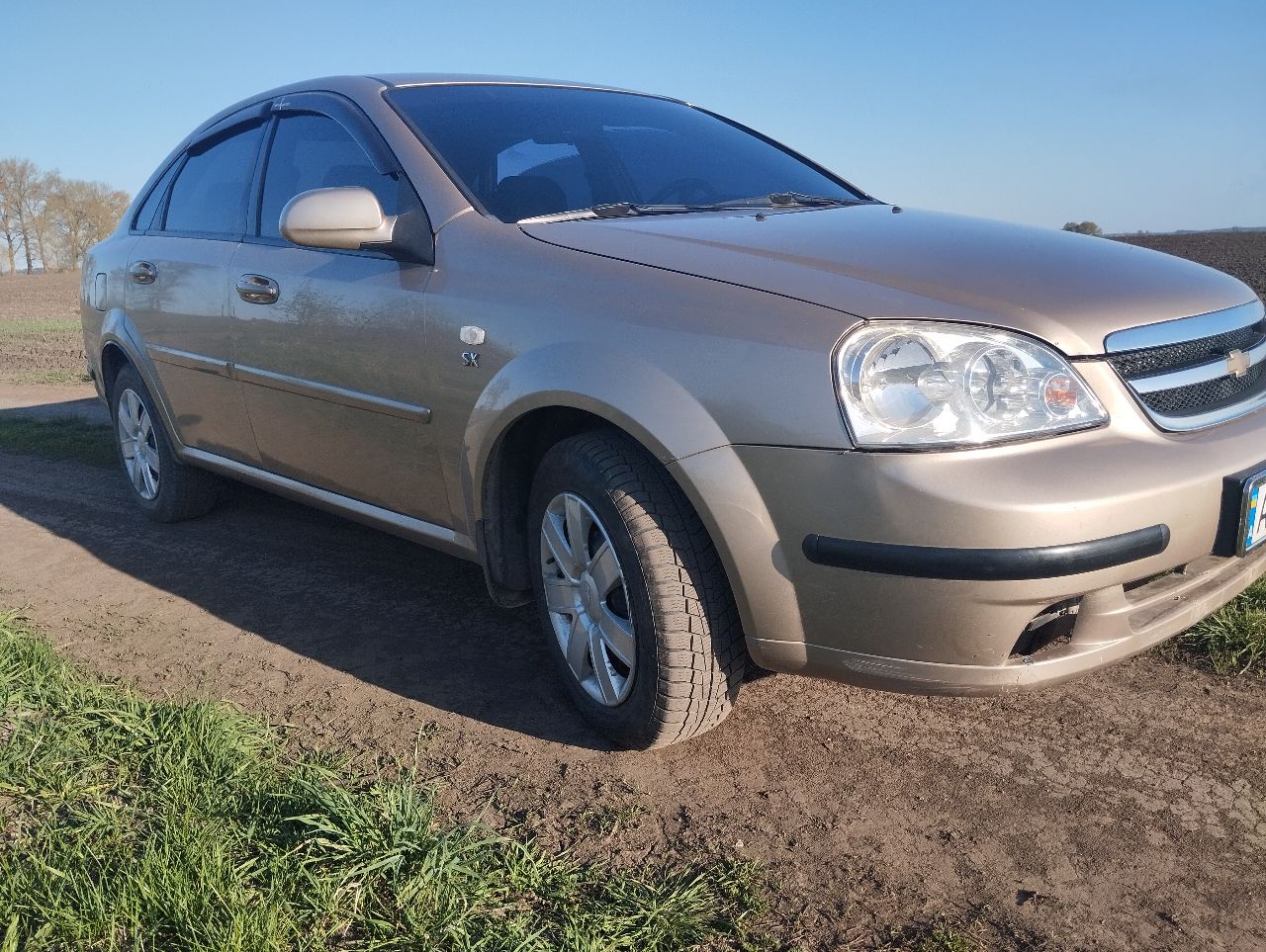 Chevrolet Lacetti - фото 12