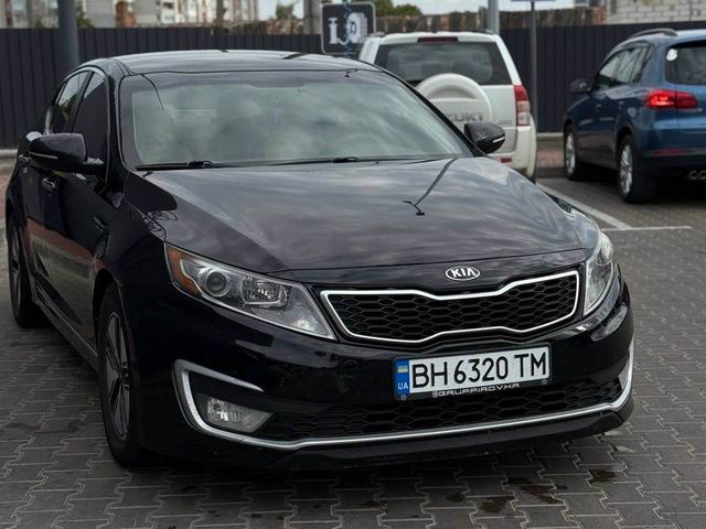 Kia Optima - фото 1