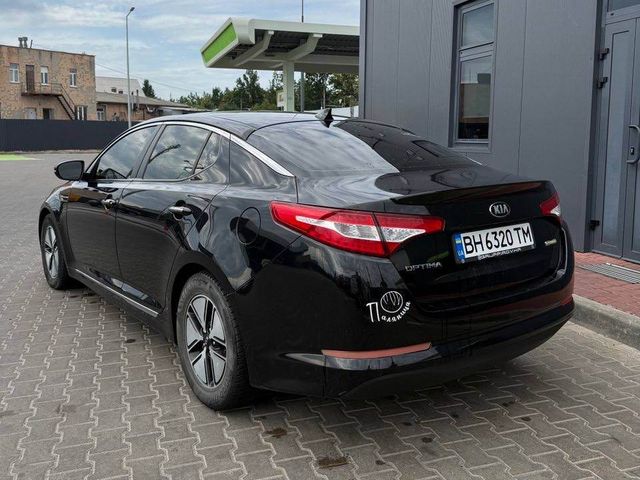 Kia Optima - фото 5