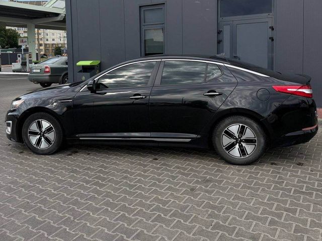Kia Optima - фото 4