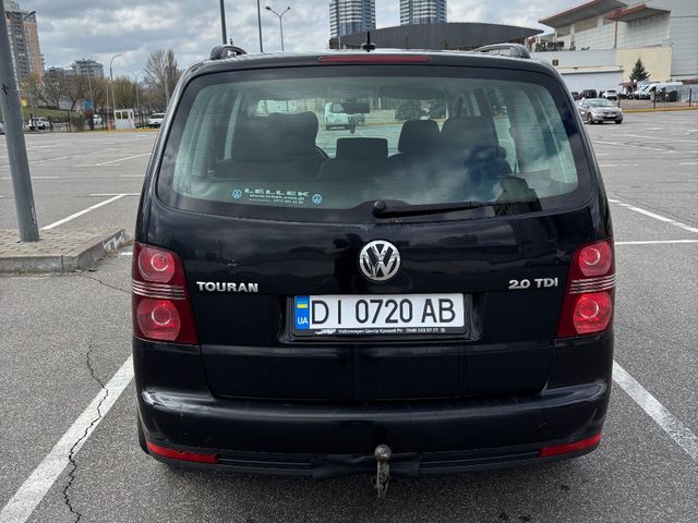 Volkswagen Touran - фото 4