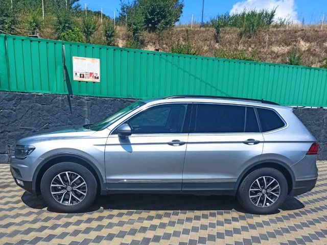 Volkswagen Tiguan - фото 1