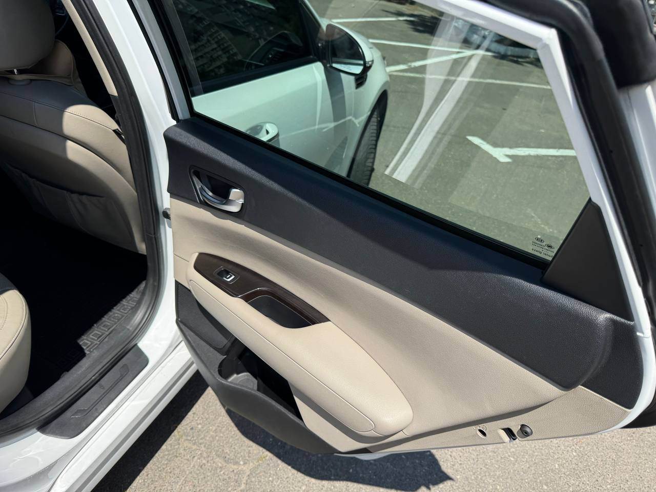 Kia Optima - фото 17