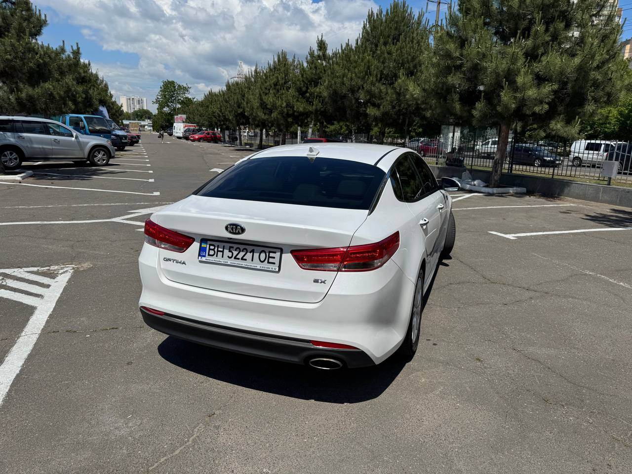 Kia Optima - фото 6